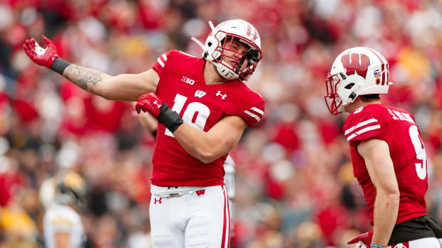Wisconsin outside linebacker Nick Herbig celebrates a sack against Iowa in 2021.
